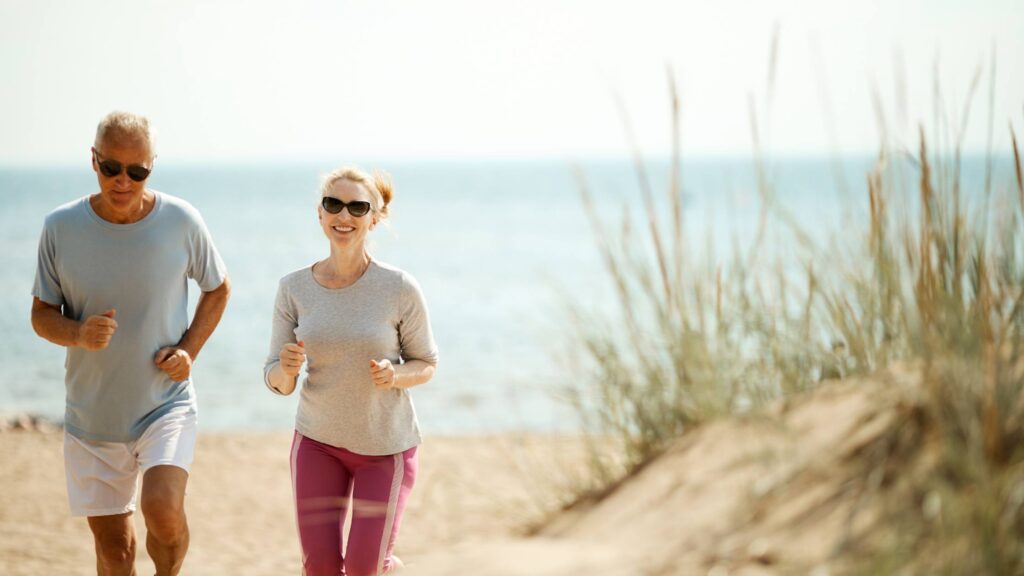 Couple running on beach