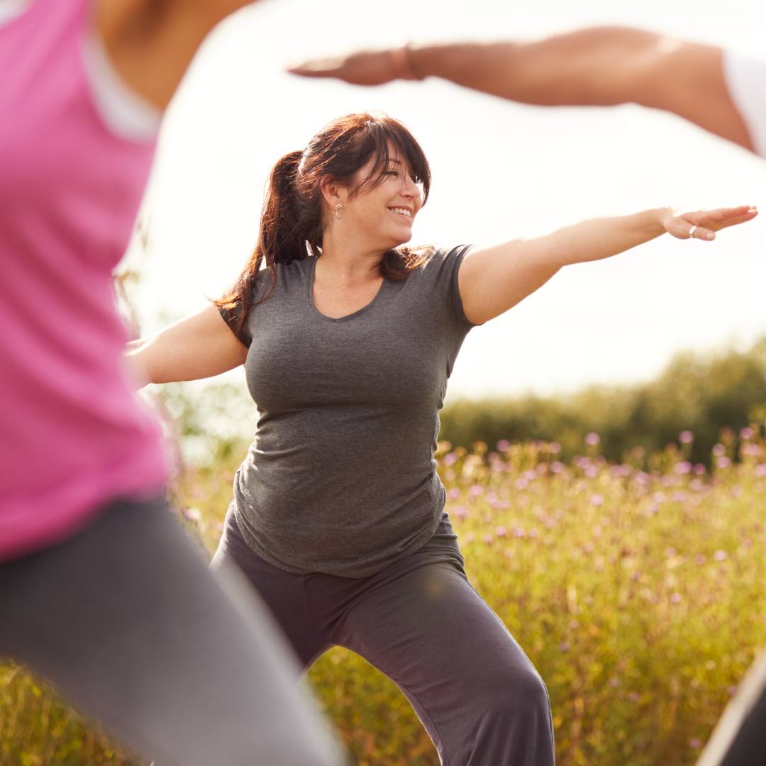 Happy woman doing yoga